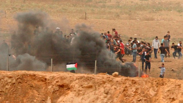  פלסטינים עימות עם כוחות (צילום: AFP)