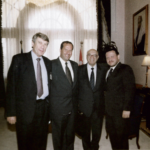 Sharf (left) and Nimrodi (second from right) with King Abdullah at the palace in Amman