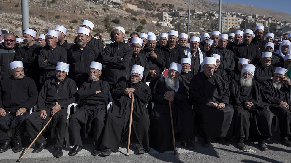 Druze religious elders at the protest (Photo: EPA)