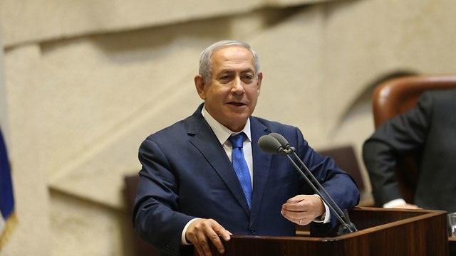 ראש הממשלה בנימין נתניהו בהתייחסות לחוק הפונדקאות במליאת הכנסת (צילום: אלכס קולומיוסקי)
