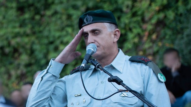 Maj. Gen. Tamir Heiman slautes Lt. Col. M. at his funeral (Photo: IDF Spokesmans Unit)
