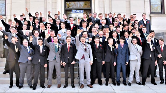 60 boys outside the Sauk County Courthouse in Baraboo