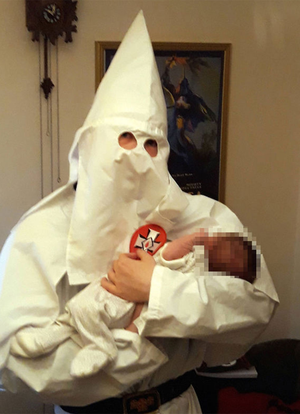Parents dressed as Ku Klux Klan