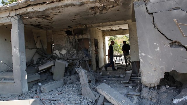 אשקלון פגיעת פגיעה בית ירי מטח רקטה רקטות עזה חמאס (צילום: AFP)