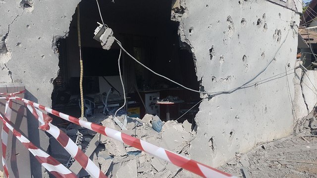 Дом в Ашкелоне, пострадавший от ракеты. Фото: Ноа Гликштейн-Керен
