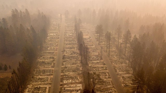 שריפה צפון קליפורניה ליד העיירה פרדייס נמשכת (צילום: AFP)