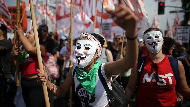 הפגנות מחוץ לוועידת G20 (צילום: רויטרס)
