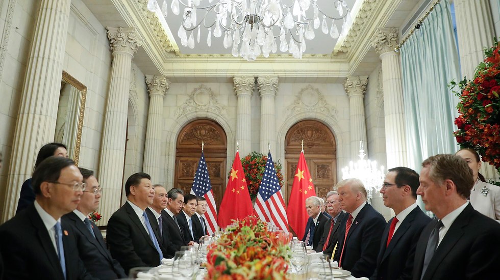 דונלד טראמפ ושי ג'ינפינג בוועידת ה-G20 (צילום: AP)