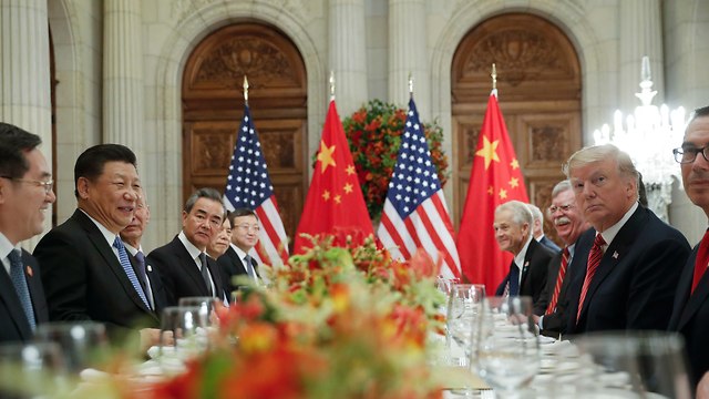 דונלד טראמפ ושי ג'ינפינג בוועידת ה-G20 (צילום: AP)