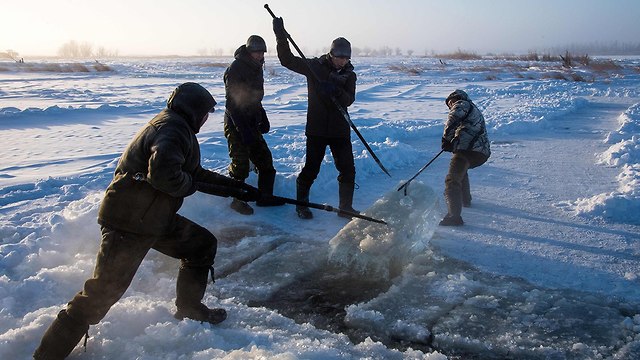 רוסיה יוקטיה במקום הכי קר בעולם בלי קרח אין חיים (צילום: AFP)