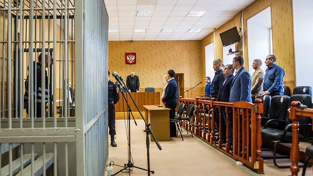 מיכאיל פופקוב שוטר לשעבר רצח עשרות נשים ב רוסיה (צילום: AFP)