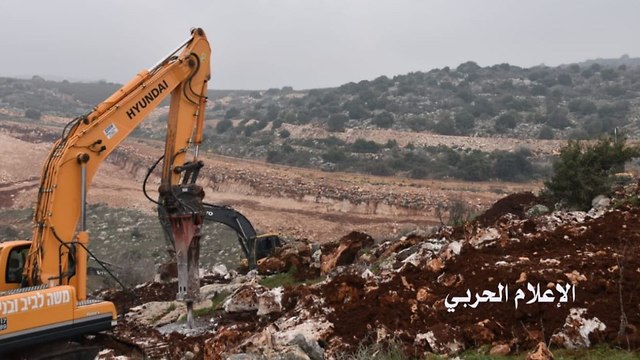 An image taken from the Lebanese side of the border showing  IDF troops destroying a Hezbollah tunnel 