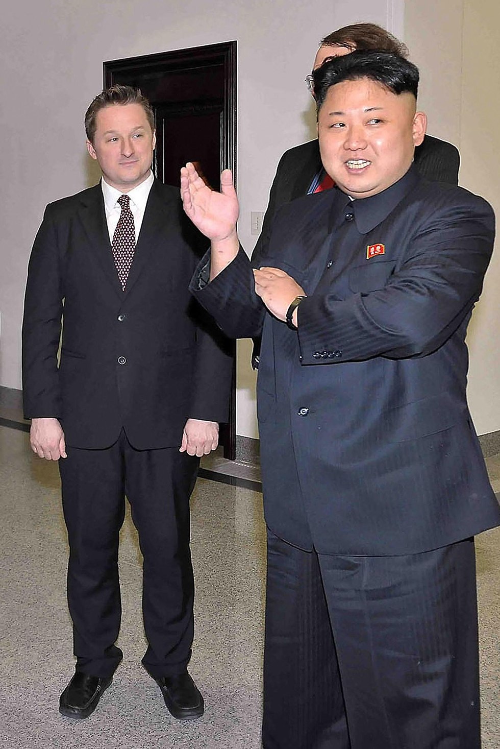 מייקל ספבור איש עסקים קנדי קנדה נעצר ב סין תמונה עם קים ג'ונג און ב צפון קוריאה (צילום: AFP)