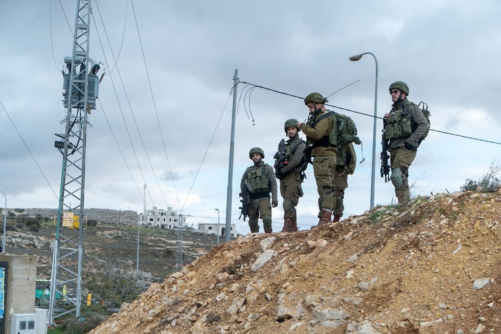 Soldiers at the Asaf Junction, where the shooting attack took place. (Photo: IDF spokesperson)