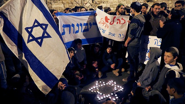 הפגנה בכיכר פריז בירושלים בעקבות הפיגועים (צילום: רויטרס)