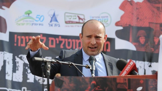 Education Minister Naftali Bennett speaks at the rally (Photo: Alex Kolomoisky)