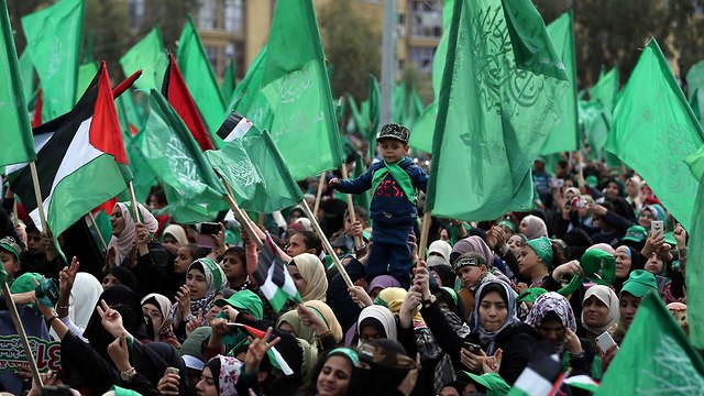 Hamas supporters attend a Gaza rally to mark the group's 31st anniversary (Photo: Reuters)
