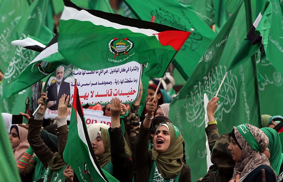 Hamas supporters attend a Gaza rally to mark the group's 31st anniversary (Photo: Reuters)
