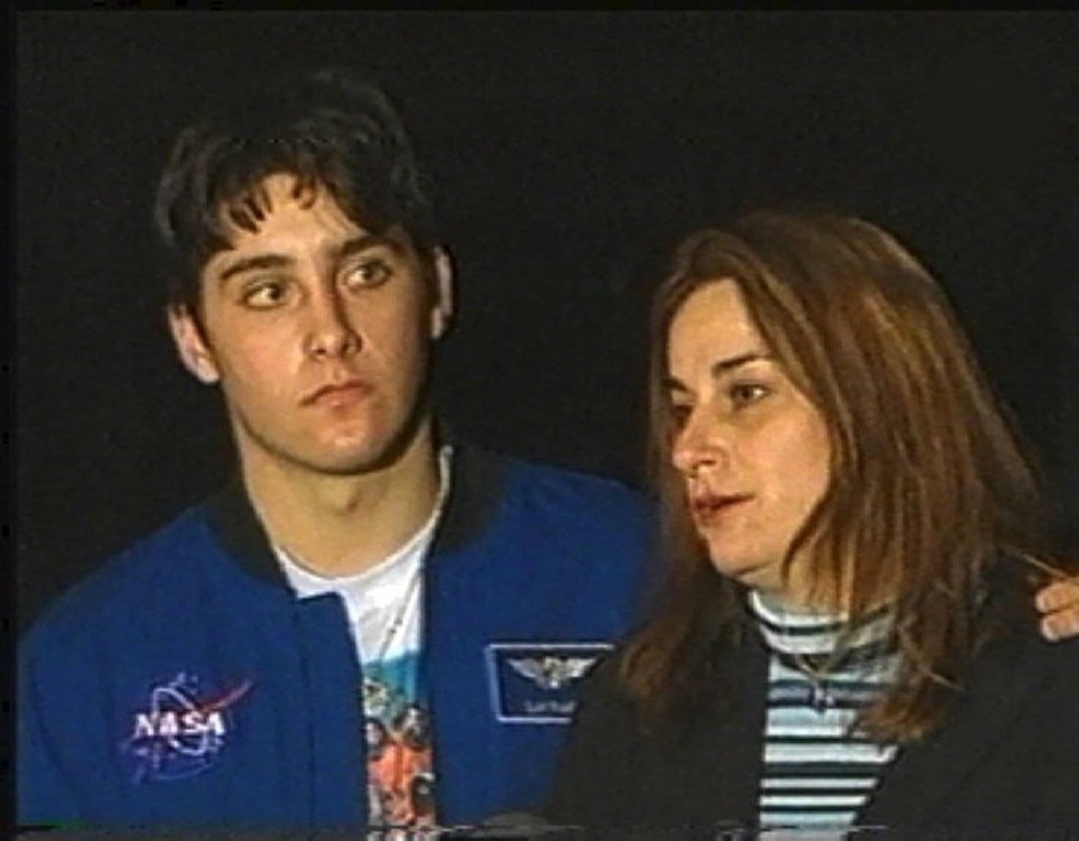 Rona Ramon and her son Assaf at her husband Ilan Ramon's funeral in 2003