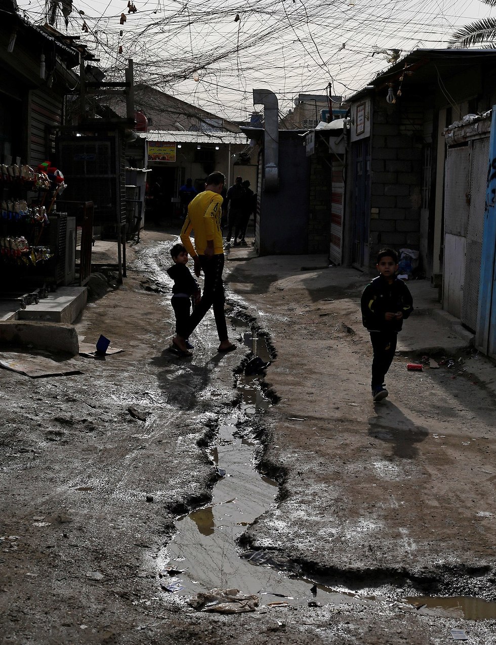 פליטים פלסטינים שכונה ב בגדד עיראק (צילום: רויטרס)