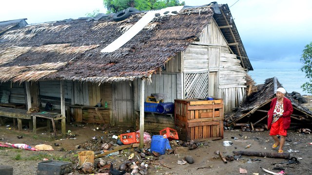 Tsunami damages in Indonesia   (Photo: Reuters)