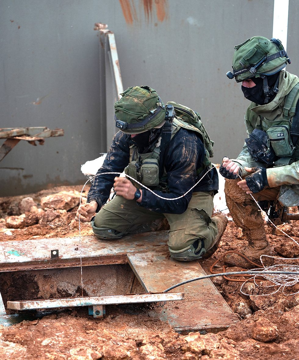 IDF troops uncovering a Hezbollah tunnel dug from Lebanon into Israel
