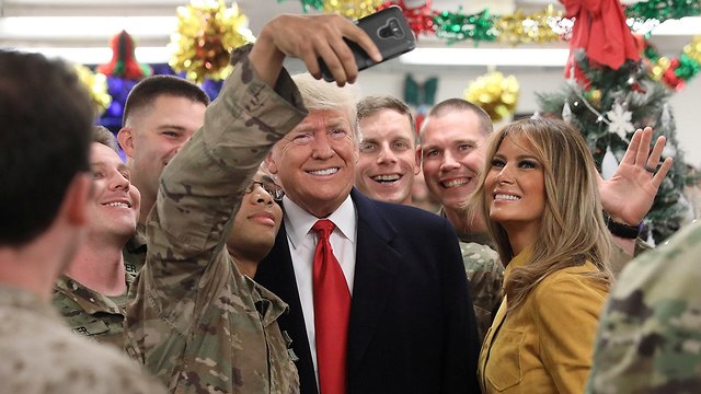 U.S President Donald Trump and his wife Melania visit U.S troops in Iraq (Photo: Reuters)