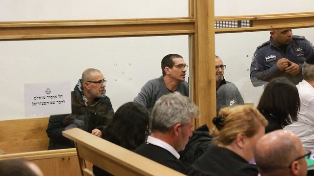 יצחק אברג'יל בבית המשפט המחוזי בתל אביב (צילום: מוטי קמחי)