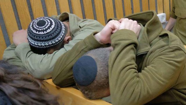 One of the charged soldiers in court (Photo: Shaul Golan)