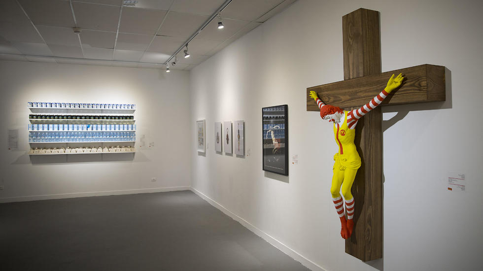 Art exhibit featuring a crucified Ronald McDonald displayed at Haifa Museum