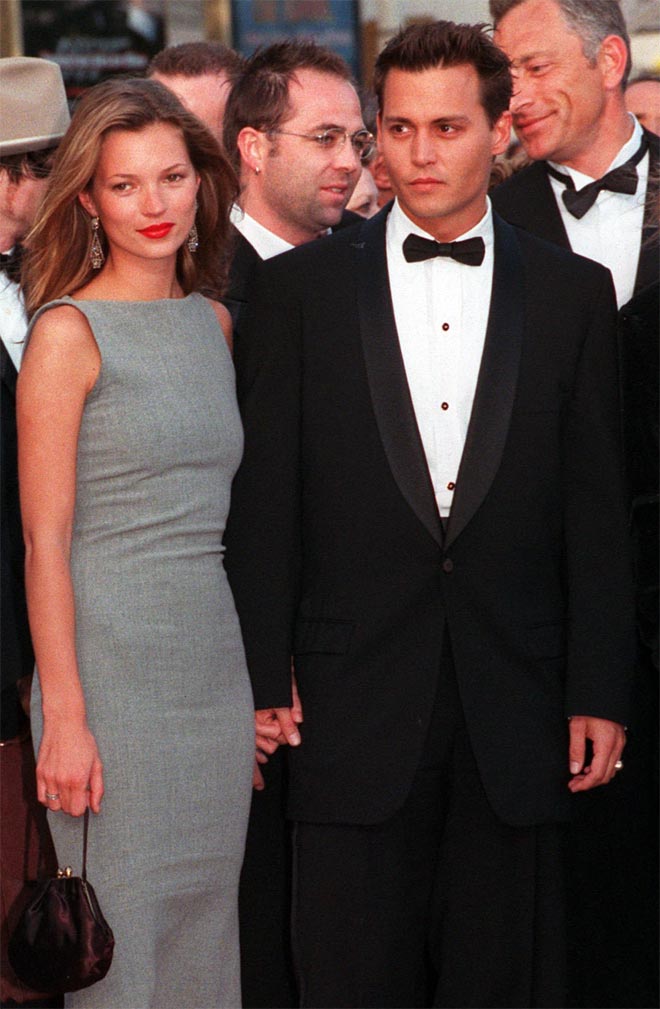 זוגיות סוערת. קייט מוס וג'וני דפ, 1997 (צילום: AP)
