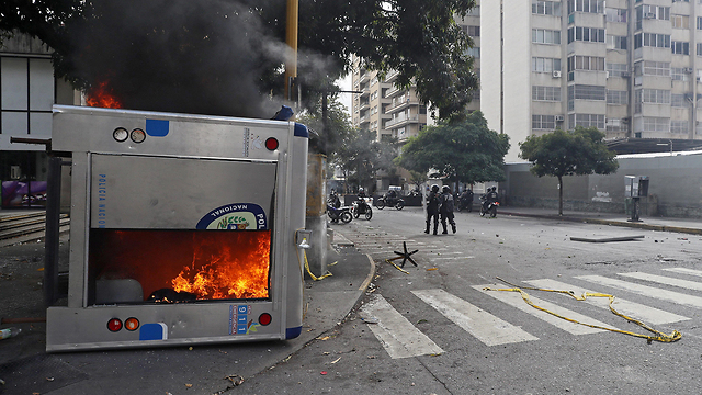 На улицах Каракаса. Фото: AFP
