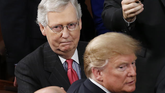 Senate Majority Leader Mitch McConnell of Kentucky (L) as US President Donald Trump departs after delivering his second State of the Union address from the floor of the House of Representatives on Capitol Hill in Washington, DC, USA, 05 February 2019.