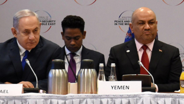 Benjamin Netanyahu sits beside Yemen's foreign minister at the Warsaw conference  (Photo: AFP)