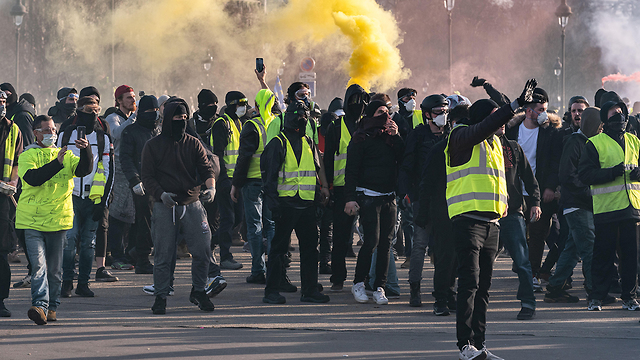 מחאת האפודים הצהובים פריז צרפת (צילום: MCT)