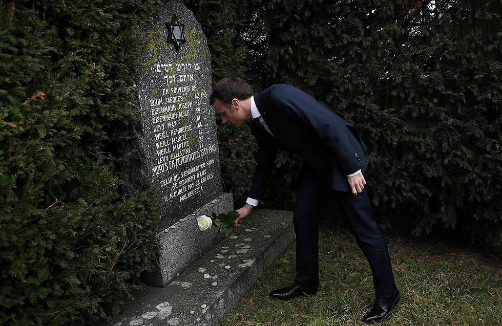 Emanuel Macron at a vandalized Jewish cemetery (Photo: AFP) 