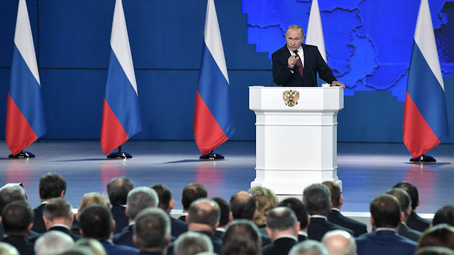 נשיא רוסיה ולדימיר פוטין נאום שנתי מצב האומה פרלמנט מוסקבה (צילום: AFP)