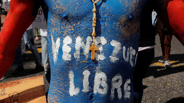 ונצואלה עימותים שיירת סיוע הפגנה בעד חואן גוואידו קראקס (צילום: רויטרס)