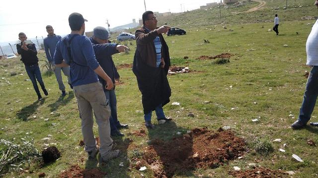 Palestinians clashing with settlers planting trees in memory of Ori Ansbacher in the West Bank  (Photo: TPS)
