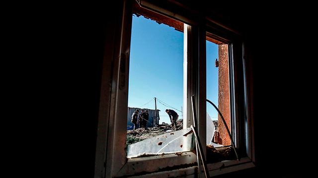 Вид из окна на руины объекта ХАМАСа. Фоо: AFP