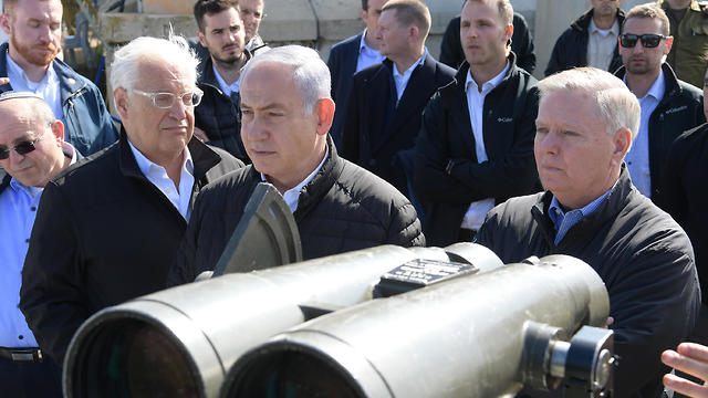 Prime Minister Netanyahu, US ambassador David M. Friedman and US Senator Lindsey Graham on a lookout in the Golan Heights (Photo: Amos Ben Gershom, GPO)