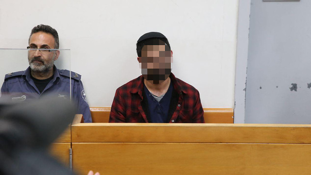 One of the suspects in court (Photo: Motti Kimchi)