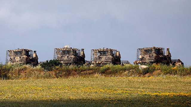 IDF vehicles on the Gaza border (Photo: Reuters)