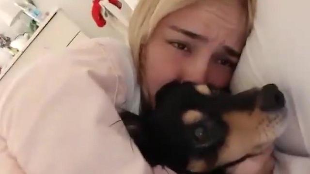 A young resident of Kibbutz Nir-Am filmed herself crying as she huddled in a bomb shelter with her dog
