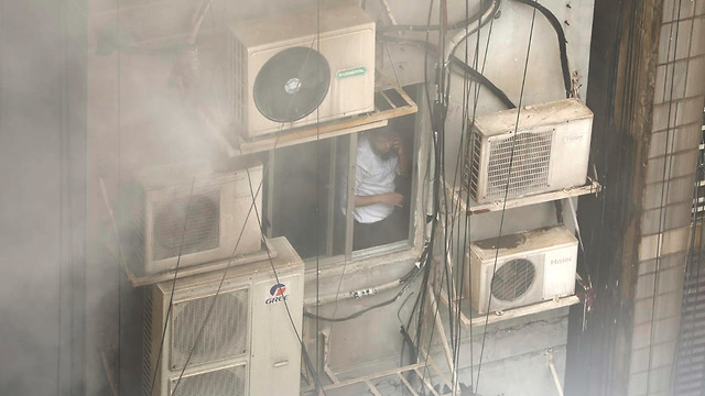 שריפה בניין ב בנגלדש  (צילום: AP)