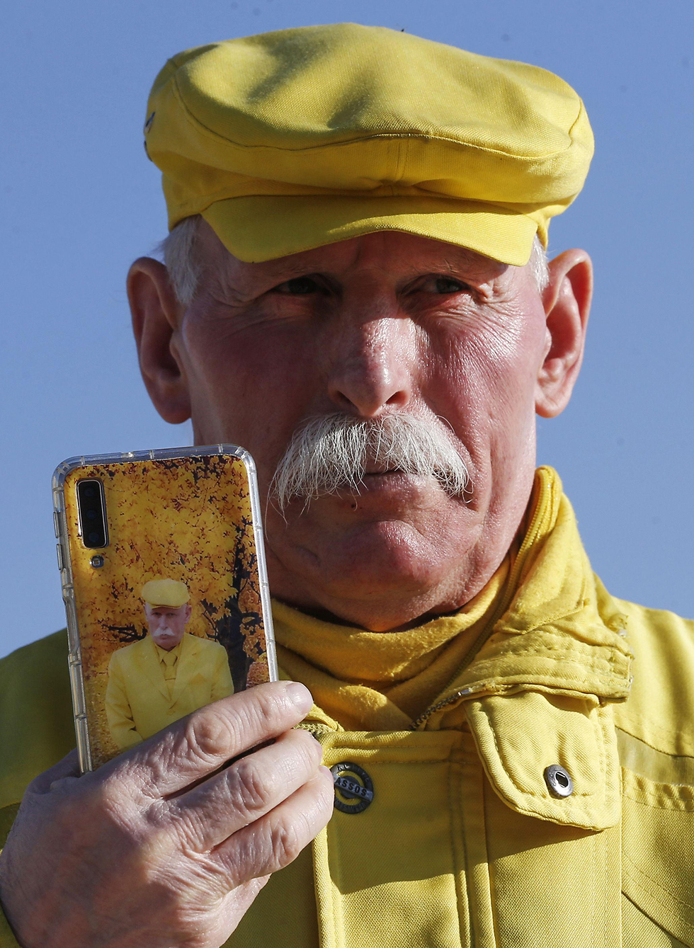 סוריה חאלב חלב אבו זכור האיש בצהוב (צילום: AFP)