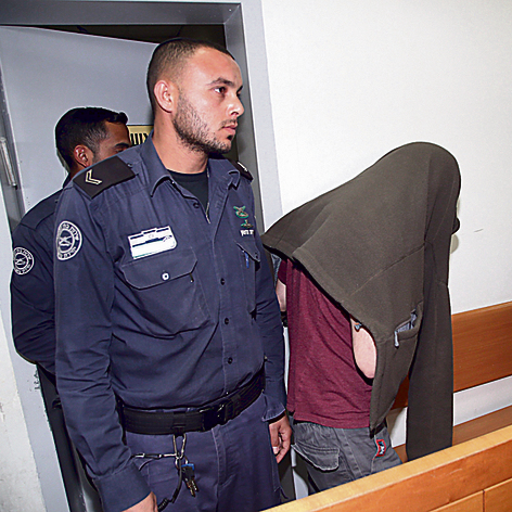 אחד החשודים בניהול טלגראס בישראל בדיון בהארכת מעצרו, 12 במארס | צילום: יריב כץ