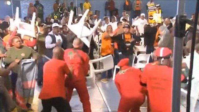 דרום אפריקה בחירות עימות טלוויזיוני שידור ישיר אלימות זריקת כיסאות ()