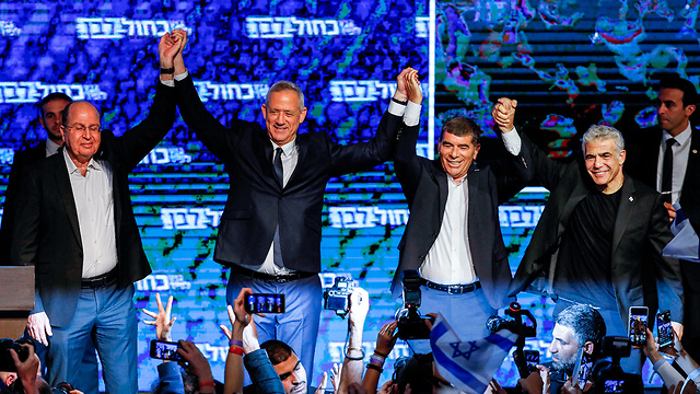 From right to left: Yair Lapid, Gabi Ashkenazi,Benny Gantz and Moshe Ya'alon celebrating victory (Photo: AFP)