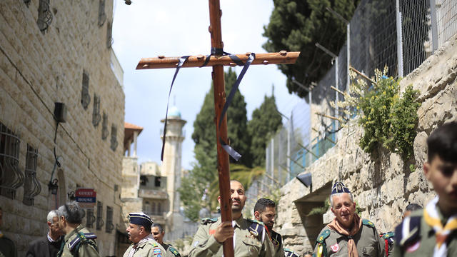 Christians from the boys scouts movement walk along the Via Dolorosa on Good Friday  (Photo: AP) 